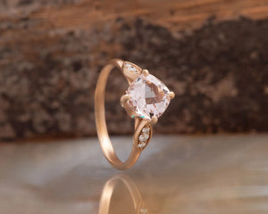 Alternative engagement ring with morganite ring and diamonds