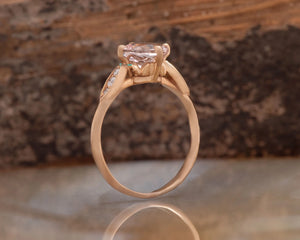 Alternative engagement ring with morganite ring and diamonds