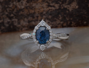 1.5 carat blue sapphire vintage engagement ring