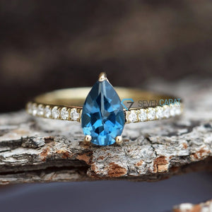 Unique engagement ring with Blue topaz