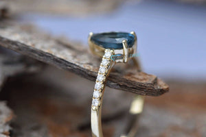 Unique engagement ring with Blue topaz