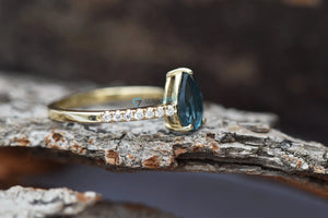 Unique engagement ring with Blue topaz