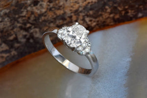 Halo oval engagement ring