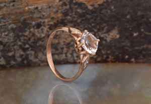 Alternative engagement ring with morganite ring and diamonds