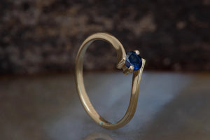 Dainty sapphire solitaire ring