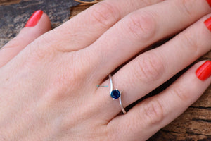 Dainty sapphire solitaire ring