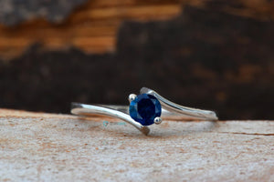 Dainty sapphire solitaire ring