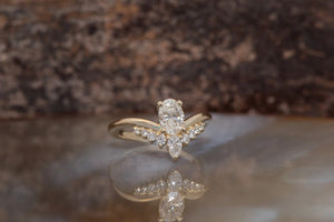 A Unique Oval 0.50 ct Diamond Ring with a Curve Band