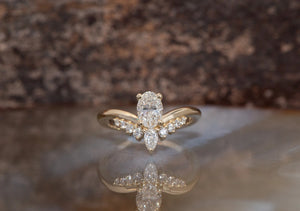 A Unique Oval 0.50 ct Diamond Ring with a Curve Band