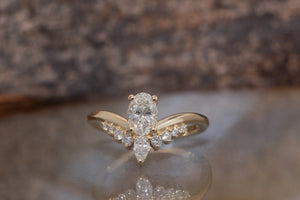 A Unique Oval 0.50 ct Diamond Ring with a Curve Band